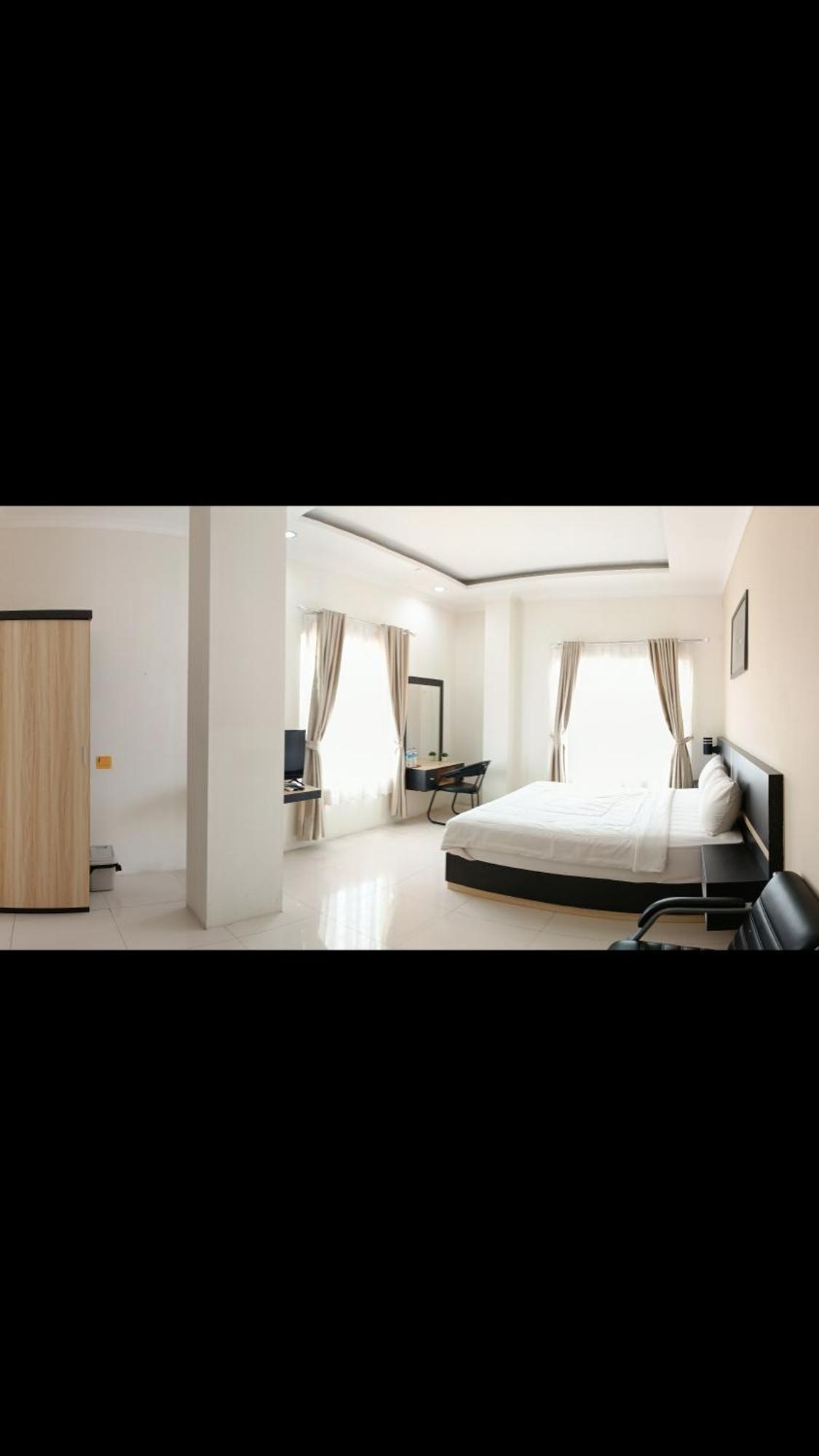 Khariz Hotel ブキティンギ エクステリア 写真